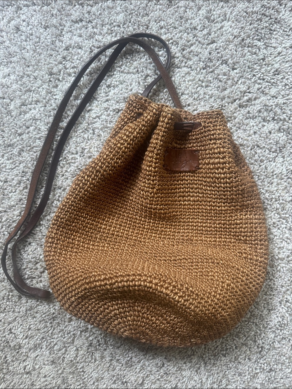 Woven Drawstring Crossbody Bag in Brown